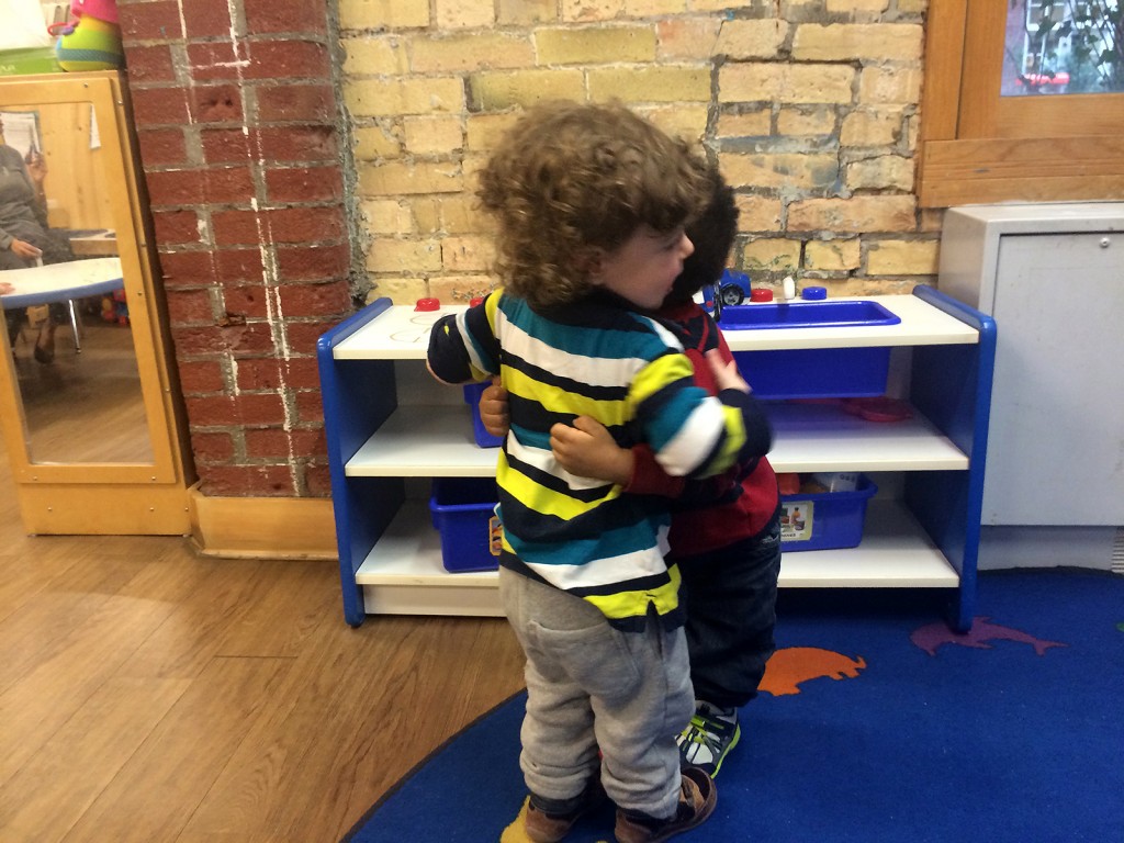 Fitz 1 year April 2015 daycare Yazsou hugging _2409