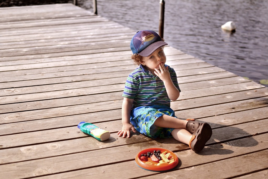 Fitz 1 year July 2015 Cottage Huntsville dock eating _6595