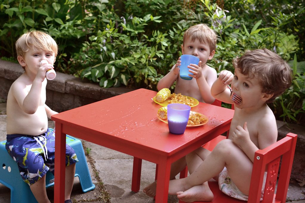 Fitz 2 years July 2016 Leo Eli backyard eating _0561