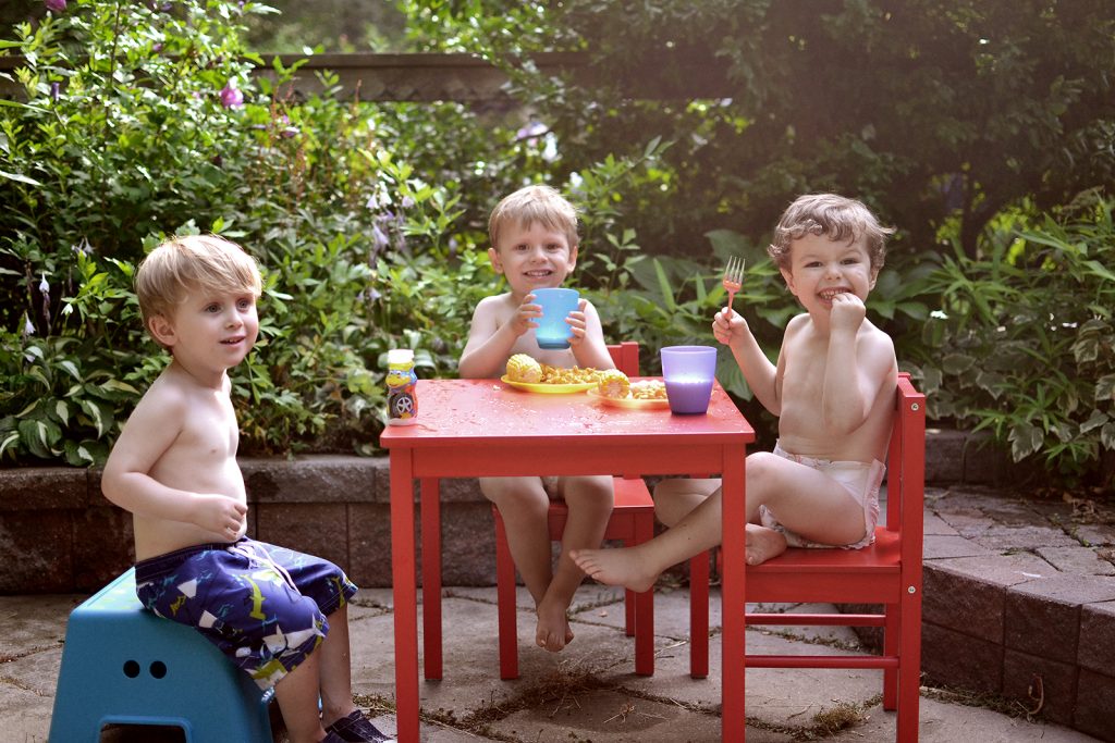 Fitz 2 years July 2016 Leo Eli eating backyard_0557